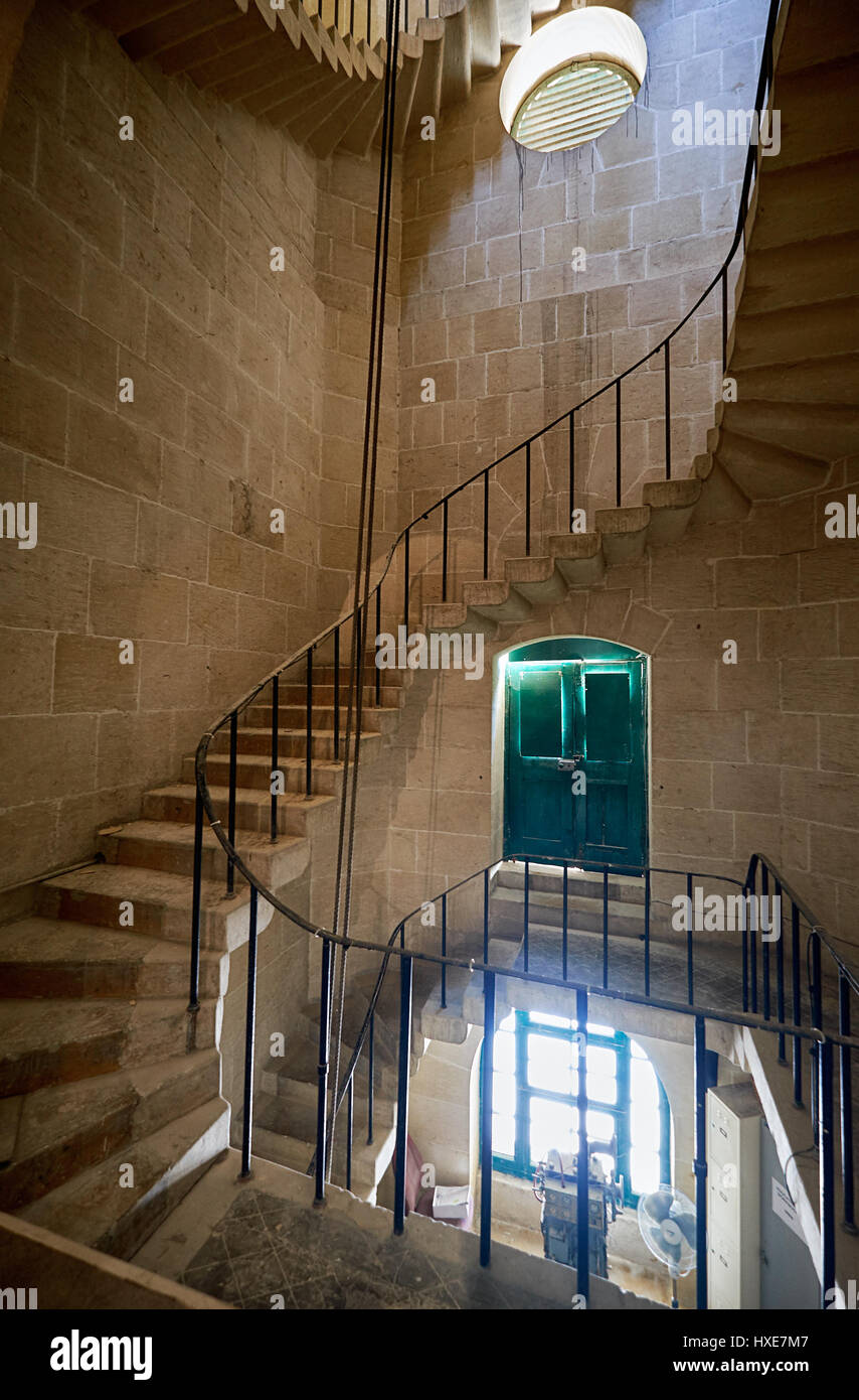BIRGU, MALTA - JULY 24, 2015: The spiral staircase in the Malta Maritime Museum (Old Naval bakery) in Vittoriosa (Birgu). Malta. Stock Photo