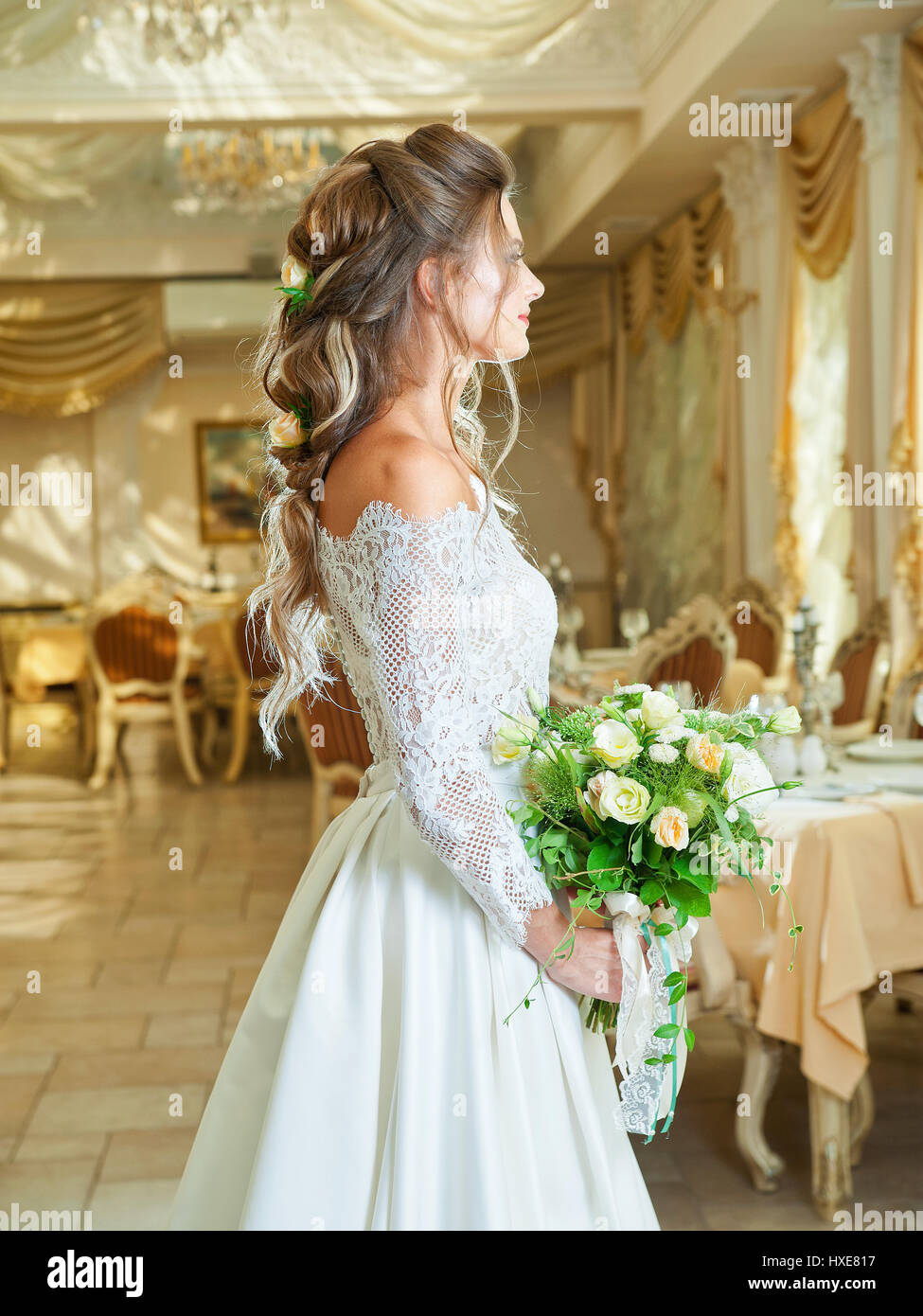 Beautiful blonde bride in a wedding dress Stock Photo - Alamy