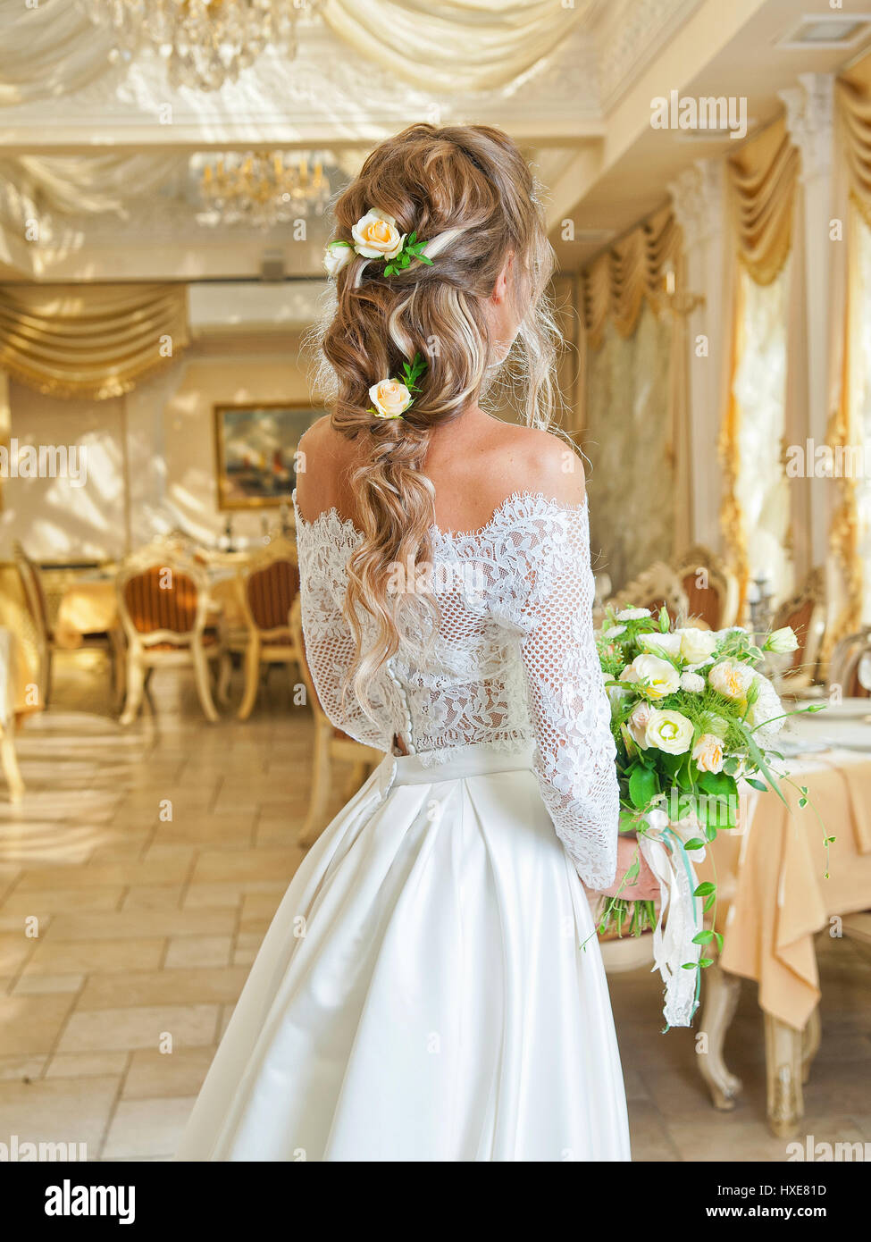 Beautiful blonde bride in a wedding dress Stock Photo - Alamy