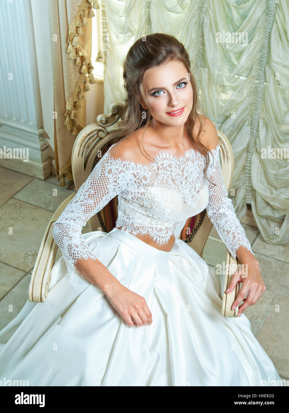 Beautiful blonde bride in a wedding dress Stock Photo - Alamy