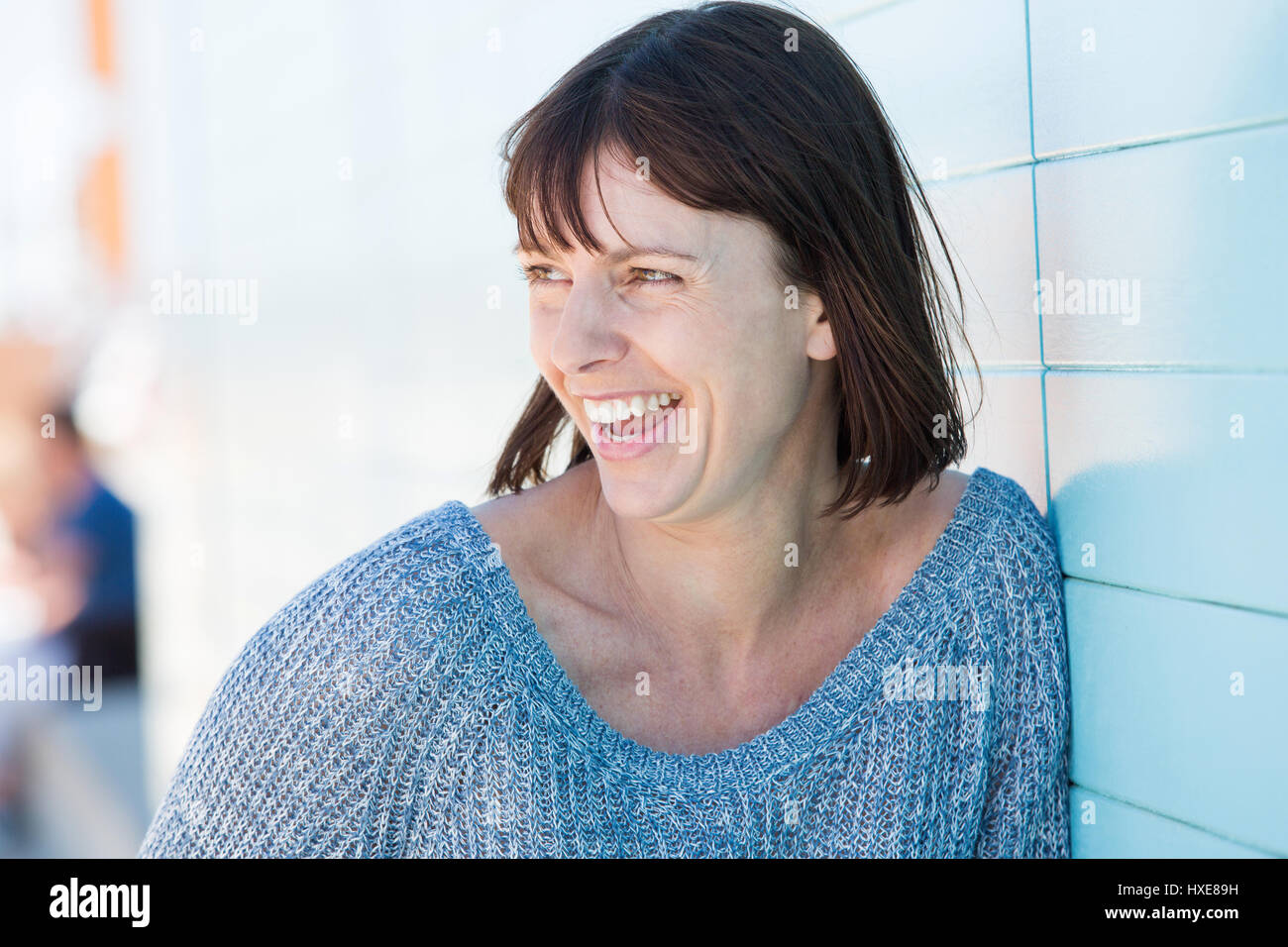 Close up portrait of a natural older woman laughing Stock Photo - Alamy
