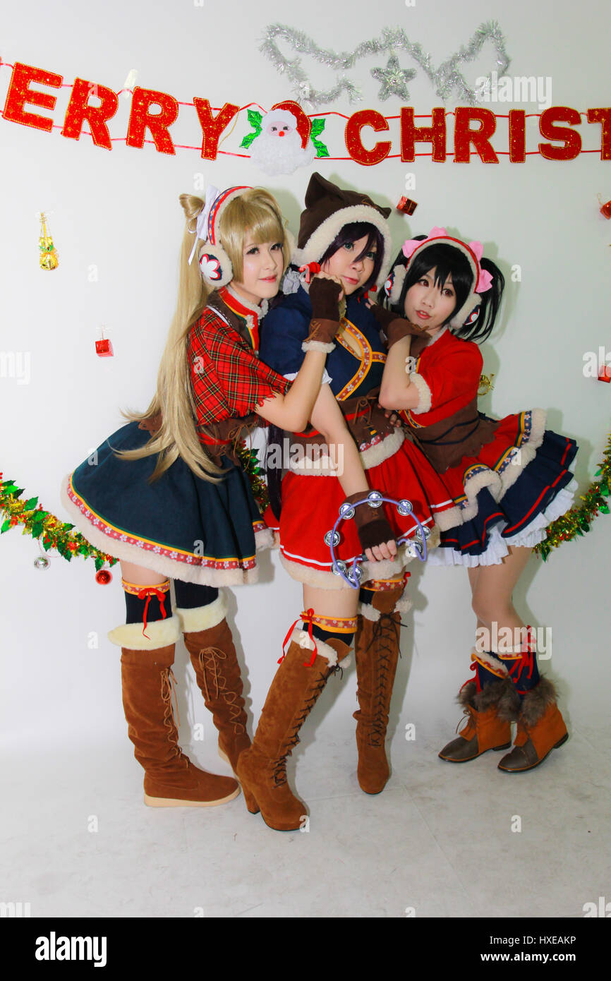 Bangkok - Dec 28: An unidentified Japanese anime cosplay pose  in COSCOM EXTRA : Christmas  on December 28, 2014 at Suan Dusit Rajabhat Univeristy, Ba Stock Photo