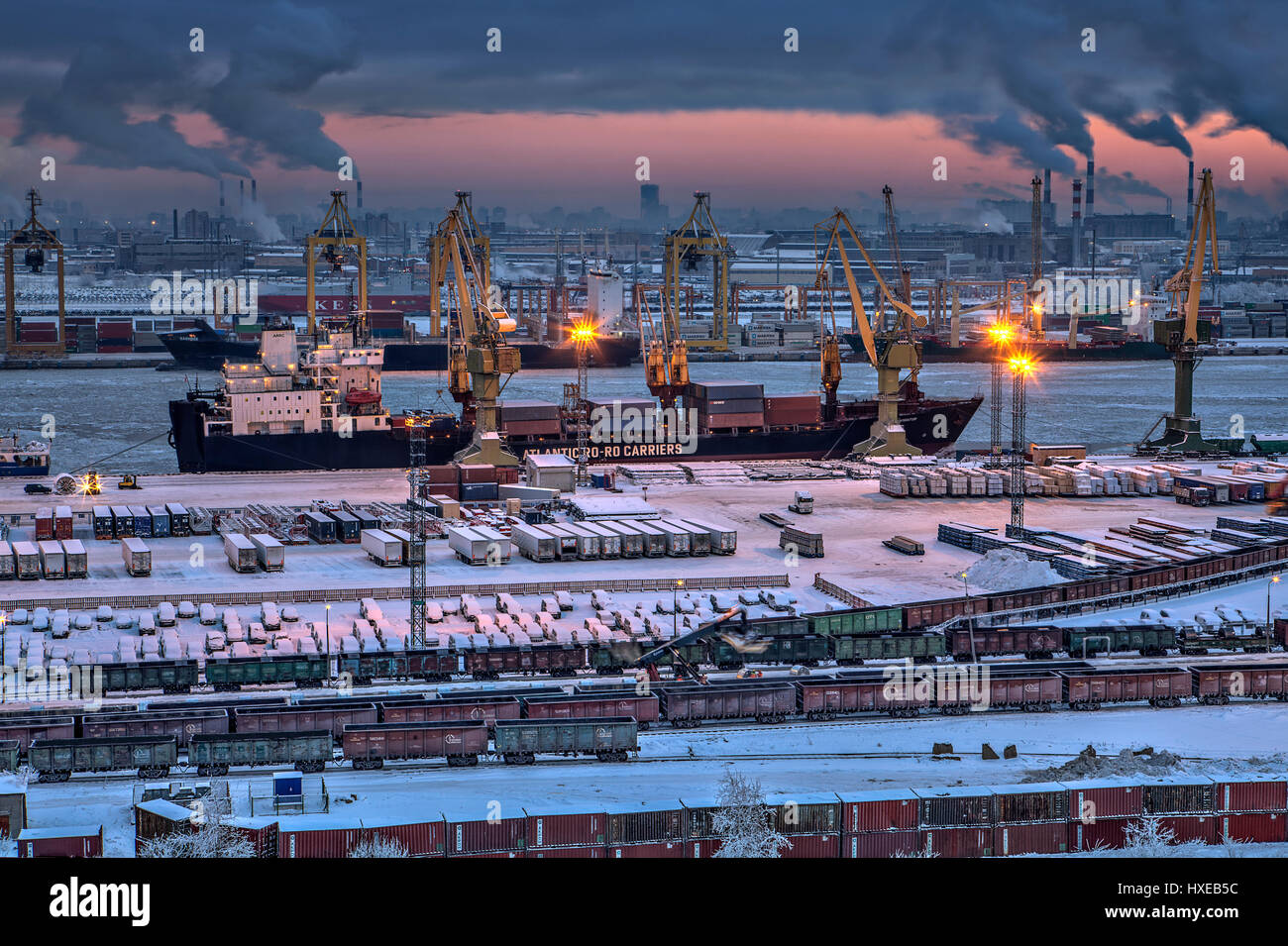 St.Petersburg, Russia - January 23, 2016: Top view of the night cargo port of Saint Petersburg , loading and unloading operations on a container ship, Stock Photo