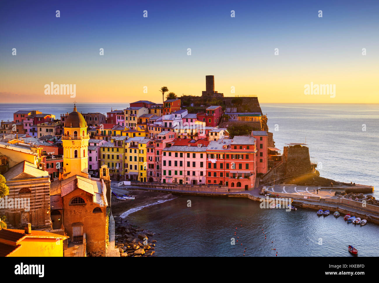 Vernazza village, aerial view on red sunset, Seascape in Five lands, Cinque Terre National Park, Liguria Italy Europe. Long Exposure. Stock Photo