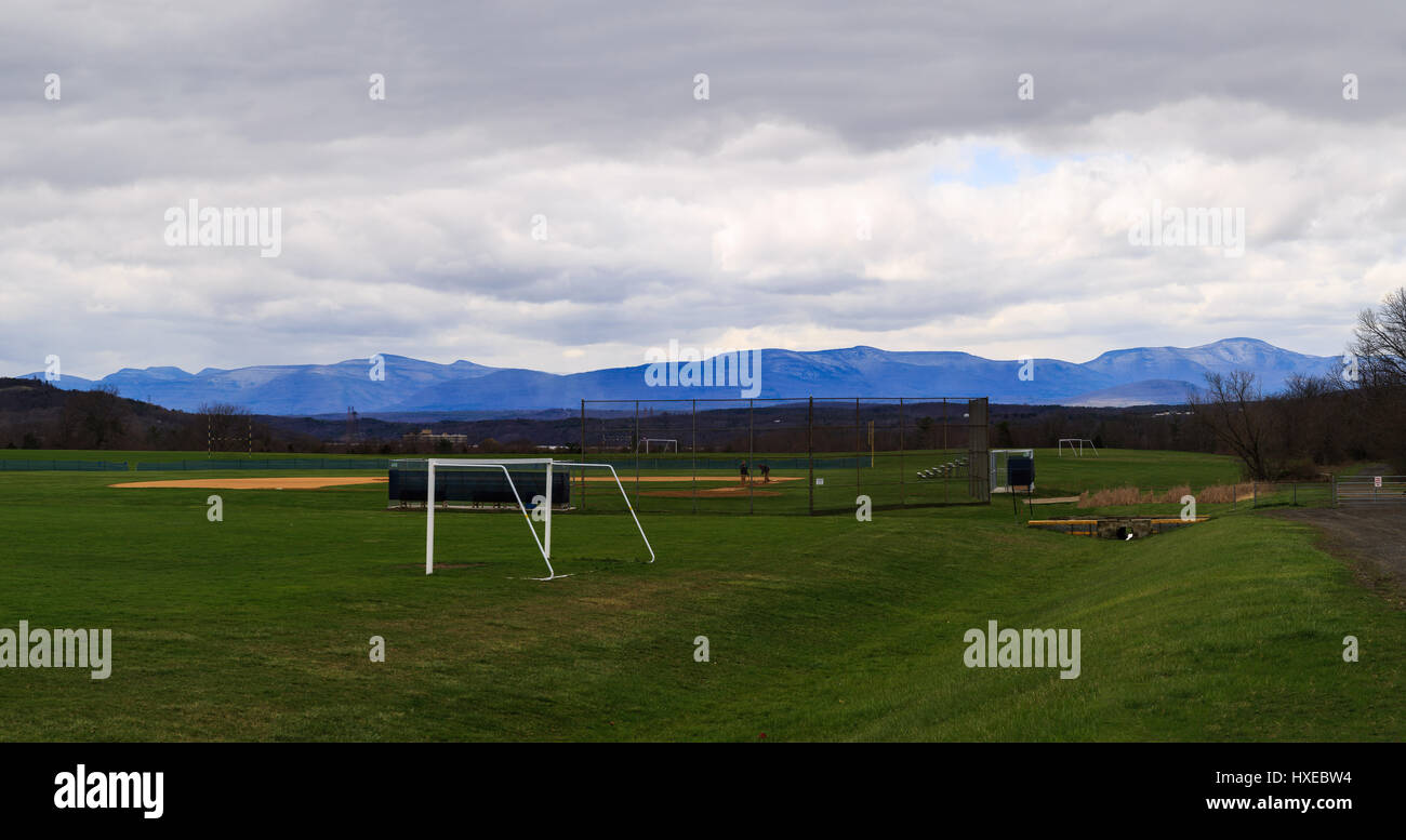 sports field in Hudson Valley NY with Catskill Mountains behind it. Stock Photo