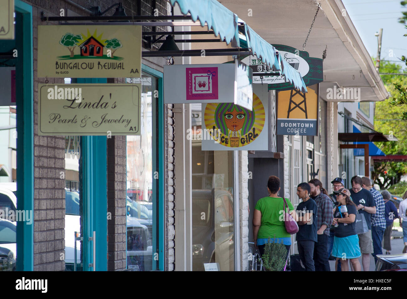 March 2017, Houston, TX Customers wait in line at Boomtown Coffee in