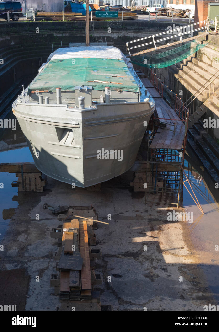 Unpowered barge Sabrina 5 being repaired and restored in Gloucester