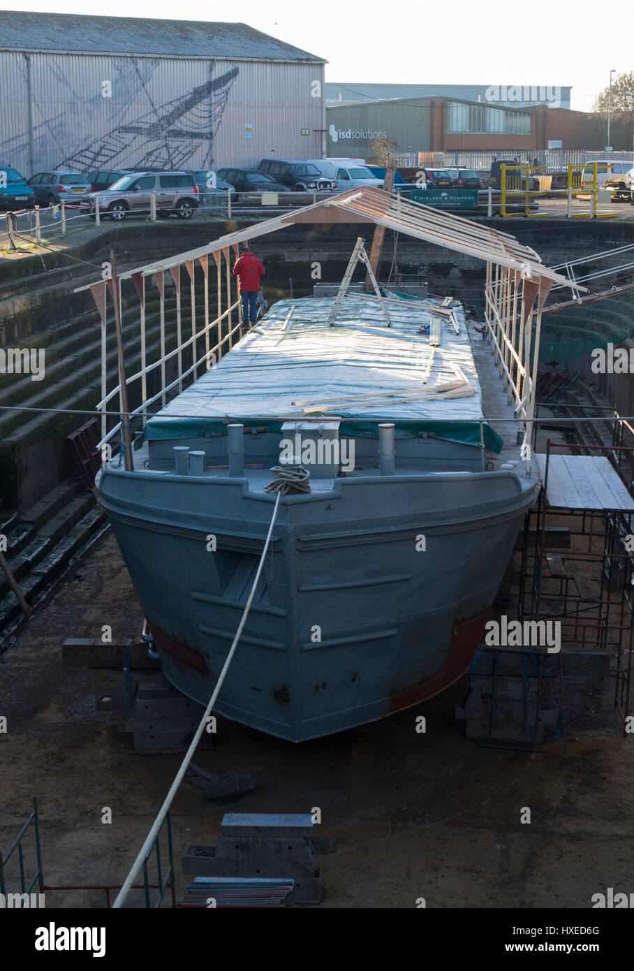Unpowered barge Sabrina 5 being repaired and restored in Gloucester
