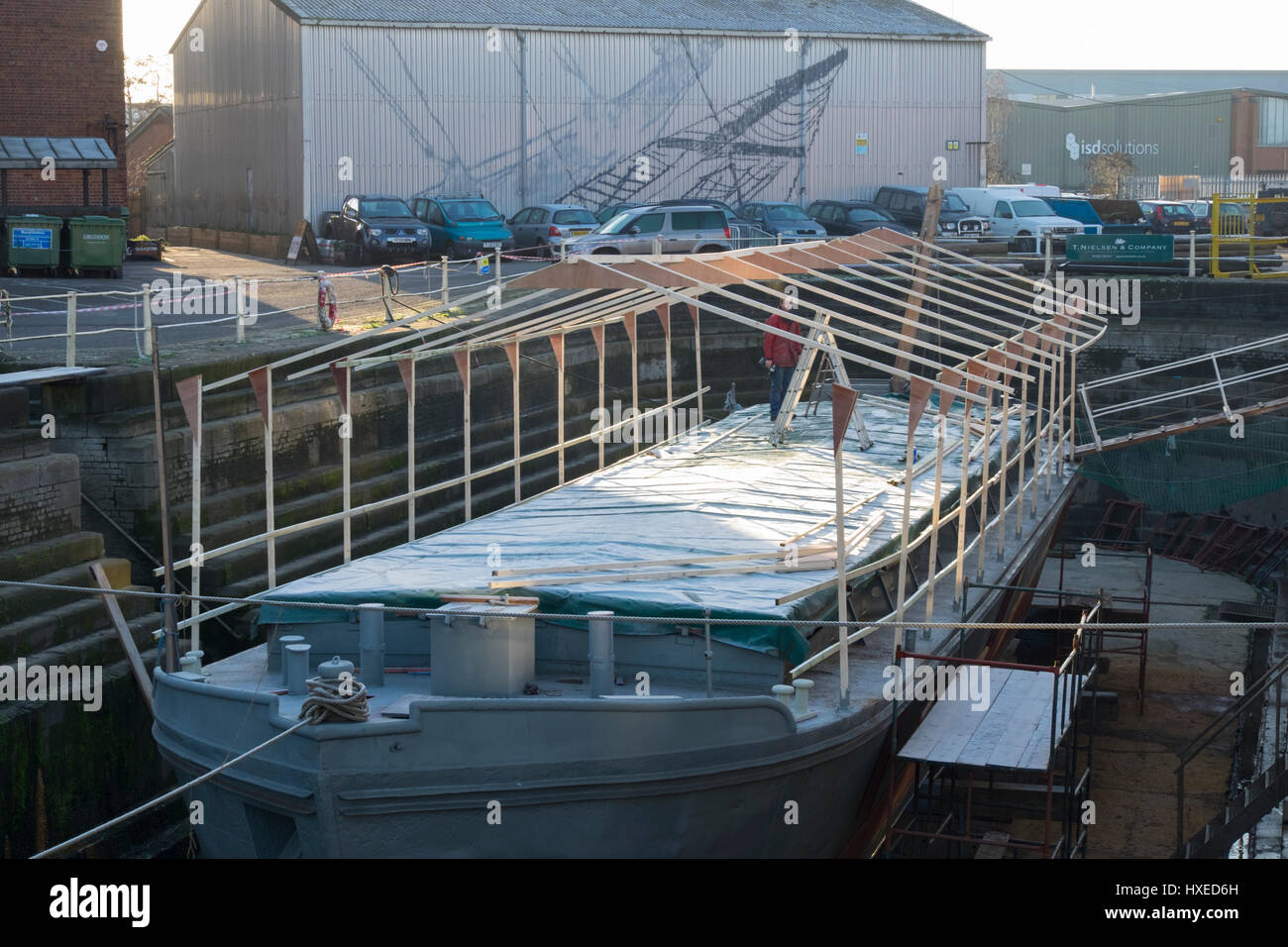 Unpowered barge Sabrina 5 being repaired and restored in Gloucester