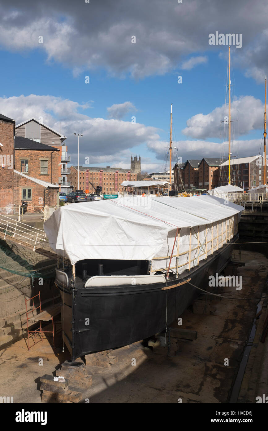 Unpowered barge Sabrina 5 being repaired and restored in Gloucester