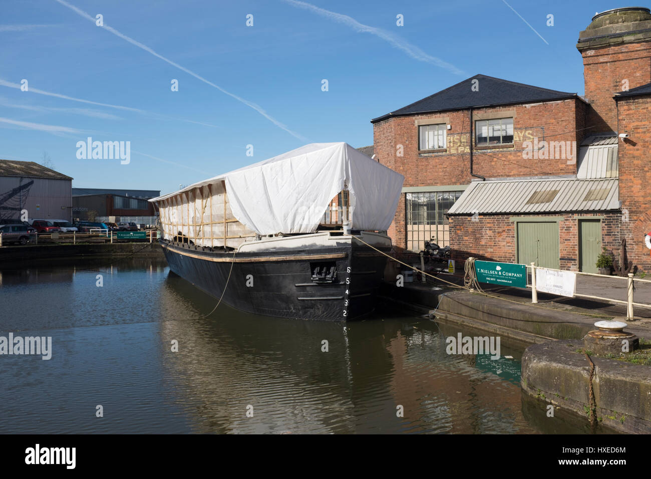Unpowered barge Sabrina 5 being repaired and restored in Gloucester