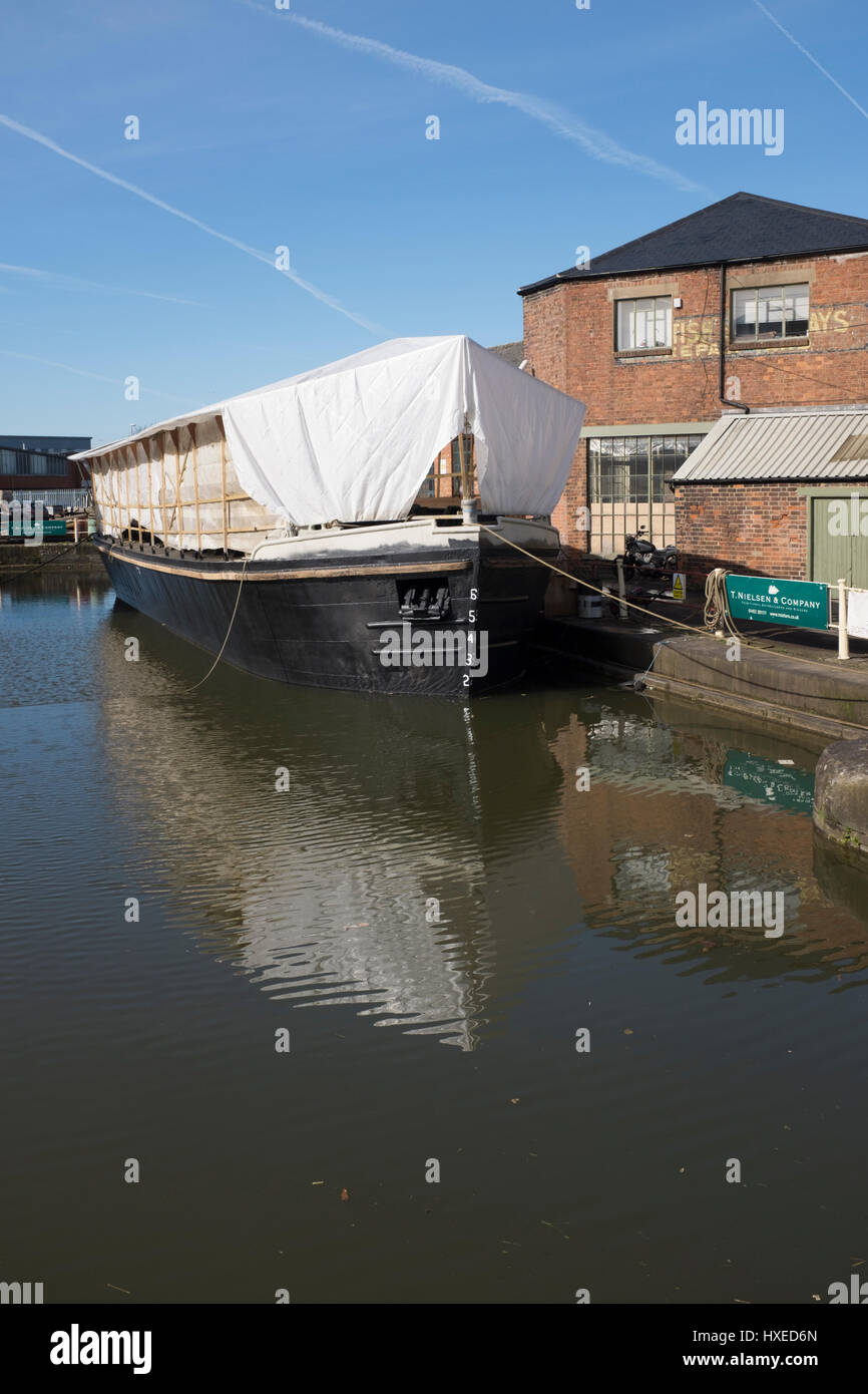 Unpowered barge Sabrina 5 being repaired and restored in Gloucester