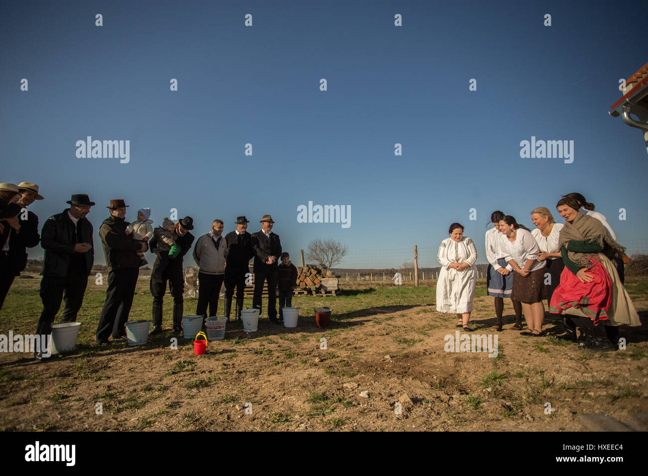 Men and women celebrating Easter in traditional way in a village in rural Hungary Stock Photo