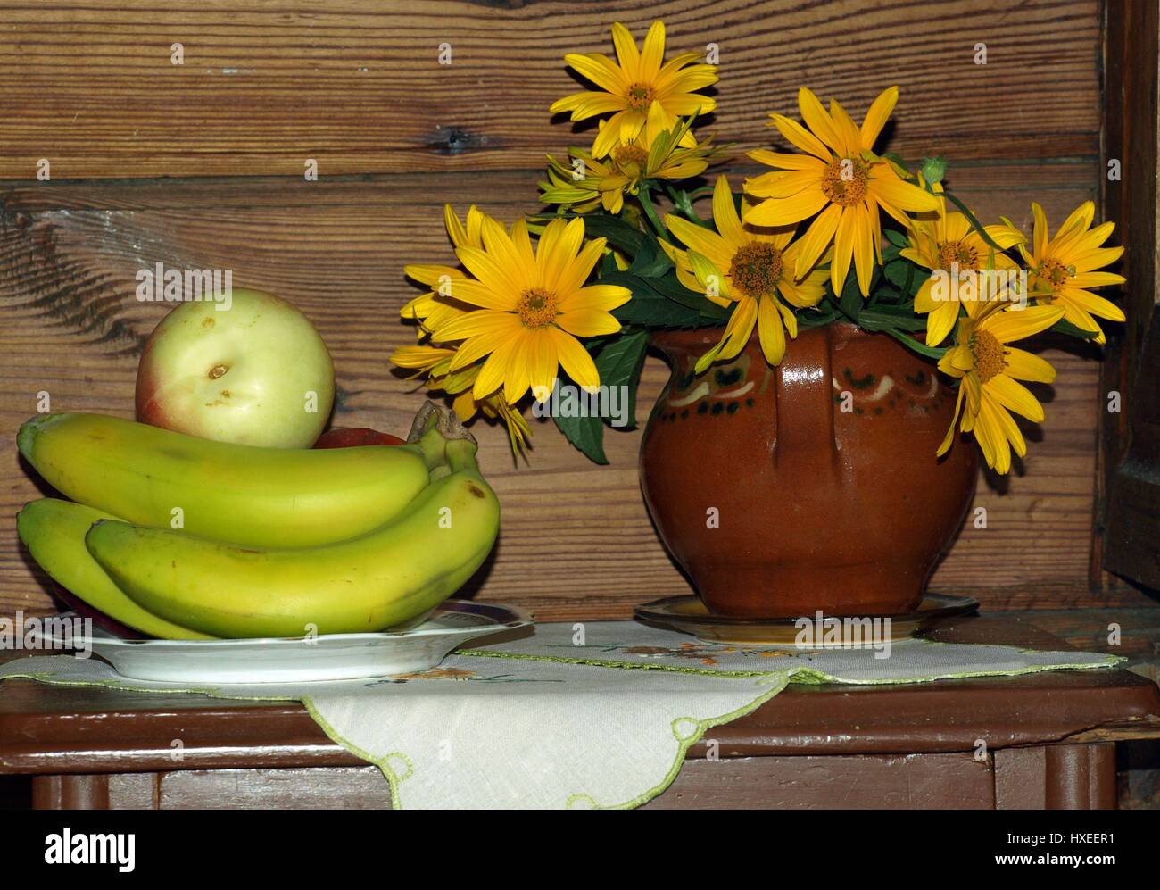 Bananas, apple and flower bouquet Stock Photo Alamy