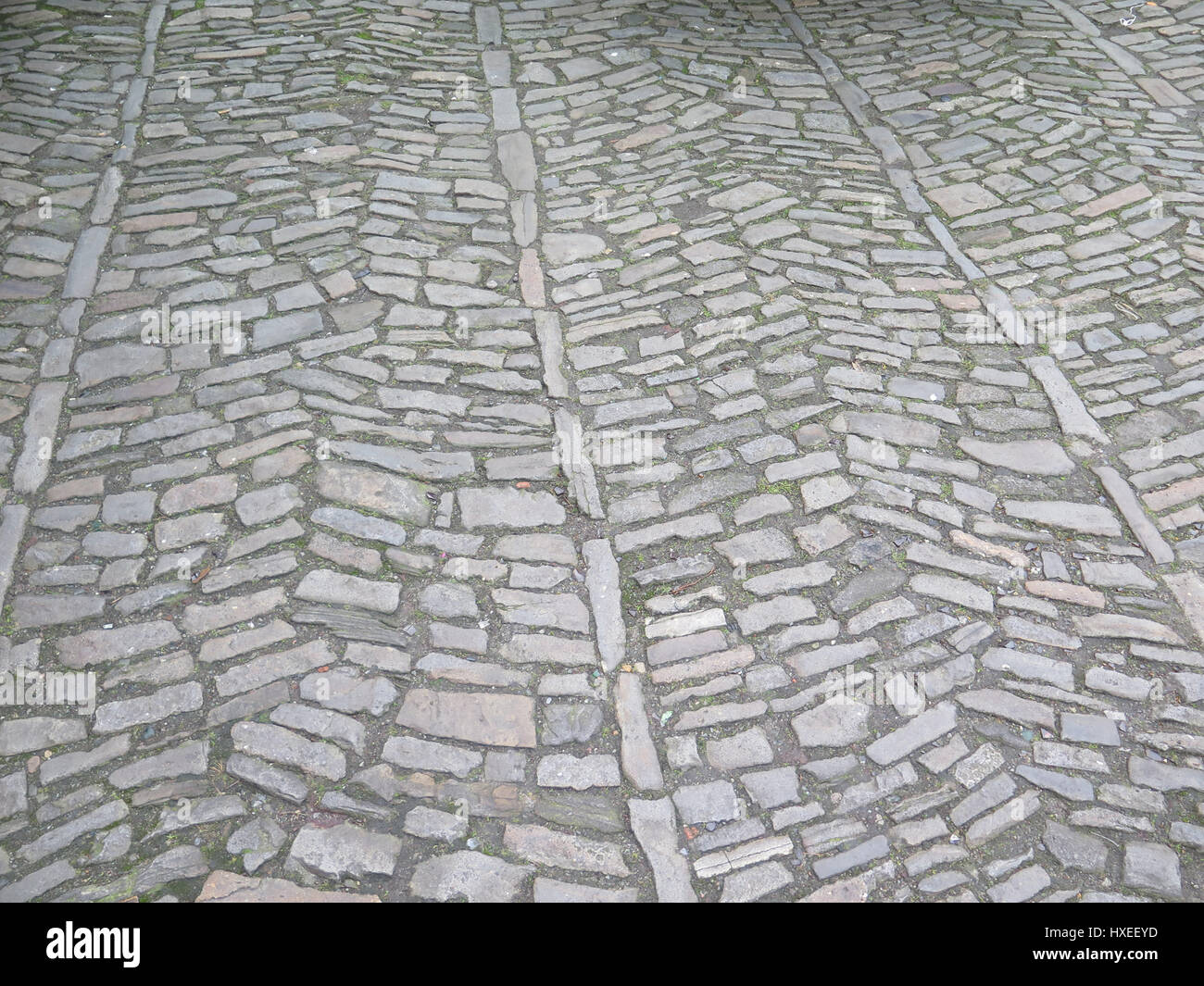 Irregular Cobble Stone pattern in town square in Munster, Germany Stock Photo
