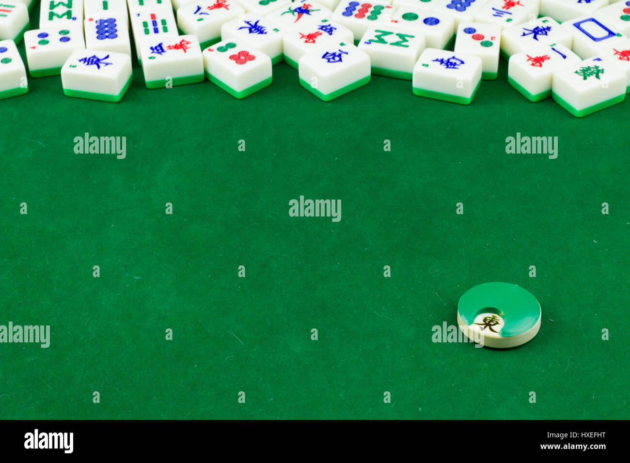 Mahjong Tabletop With Many Mahjong Tiles Lay Randomly in the Back Stock Photo