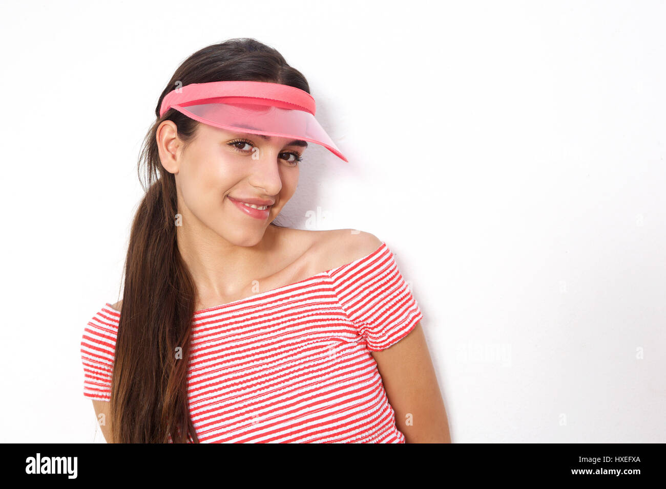 Close up portrait of a beautiful young woman with long hair smiling ...