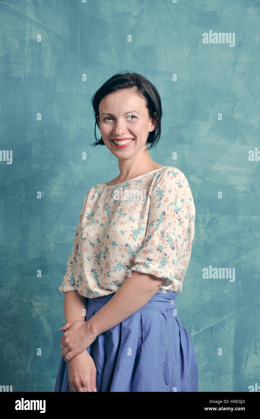 Portrait of smiling mid adult woman Stock Photo
