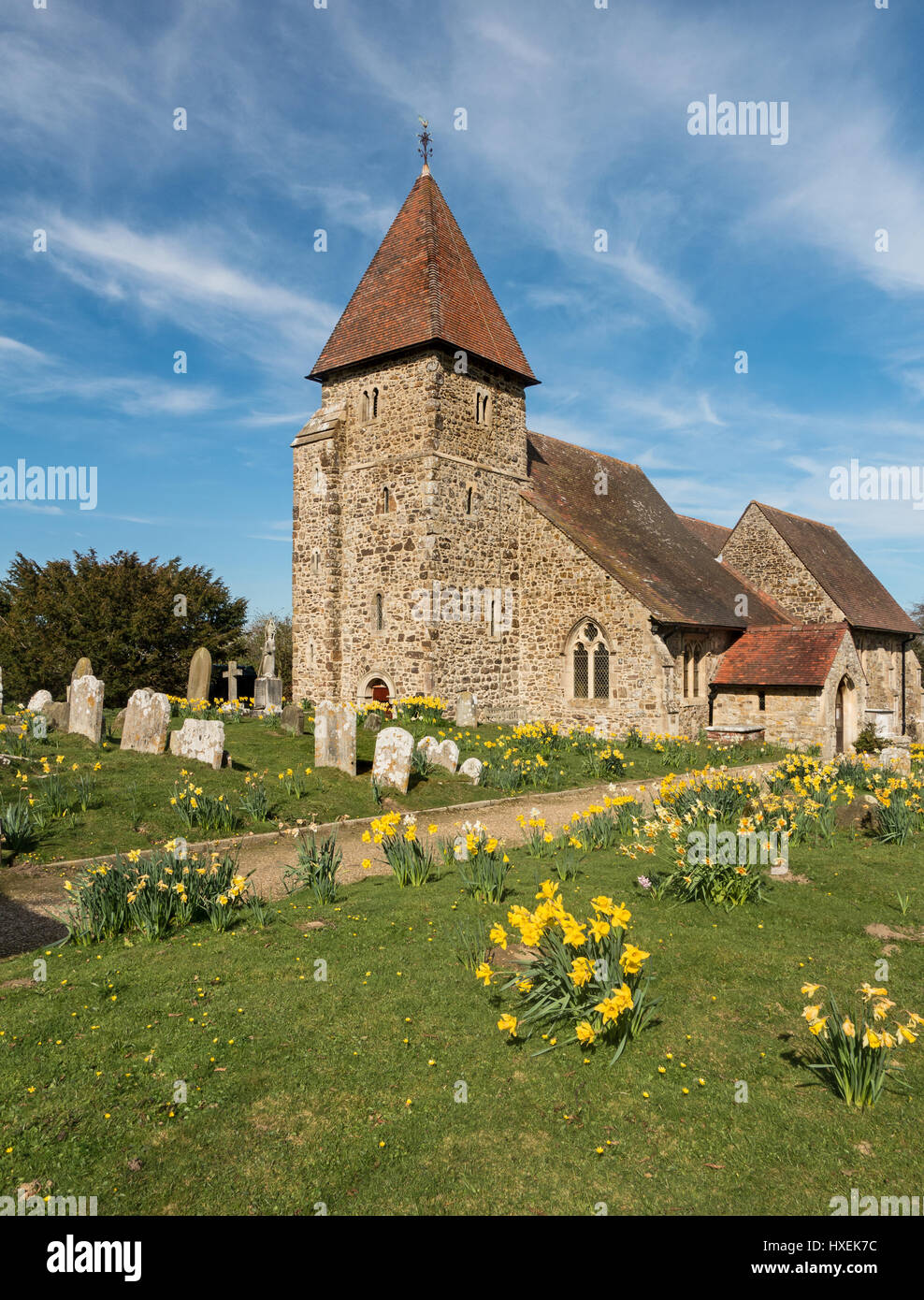 Norman church in a Quintessential English setting Stock Photo