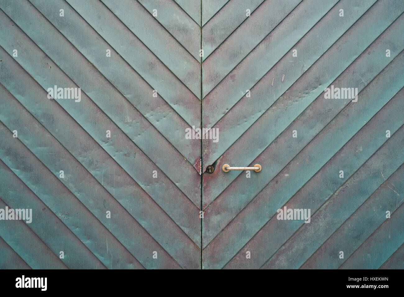 Cyan old corroded metal door texture background Stock Photo