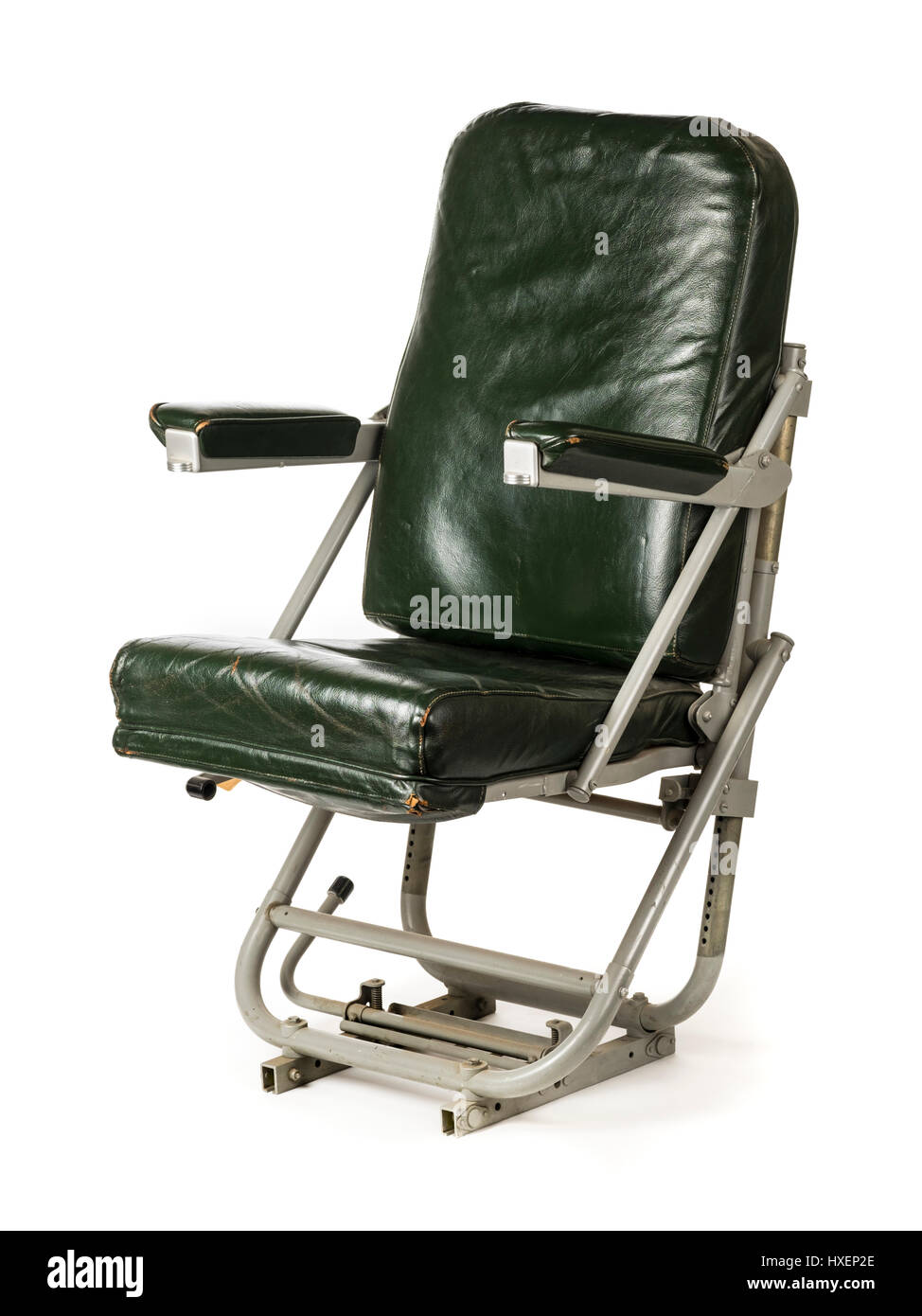 WW2 Royal Air Force DC-3 Dakota aircraft spring-loaded co-pilot seat with green leather upholstery. Manufactured by the Dennison MFG Co. Stock Photo