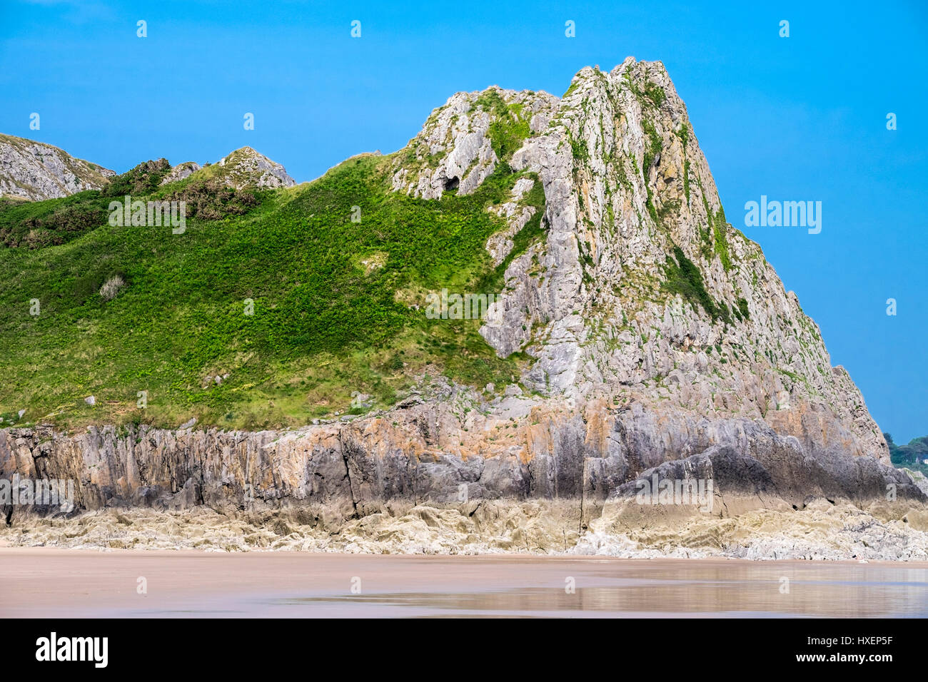 Great Tor in Oxwich Bay, Gower Peninsula, South Wales (UK), a popular place for local rock climbers. Stock Photo