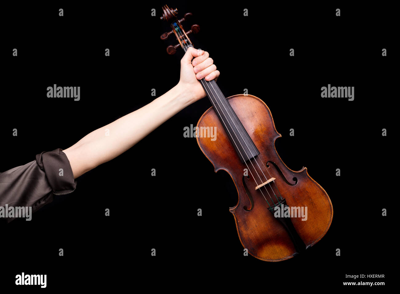 right arm of a female violin player rising out and holding an