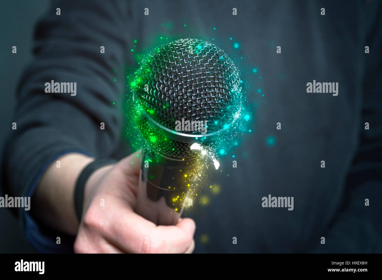 Microphone in hand. Stock Photo