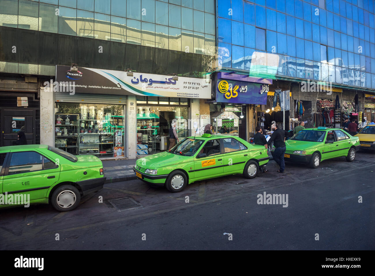 Green taxi cars in Tehran city, capital of Iran and Tehran Province