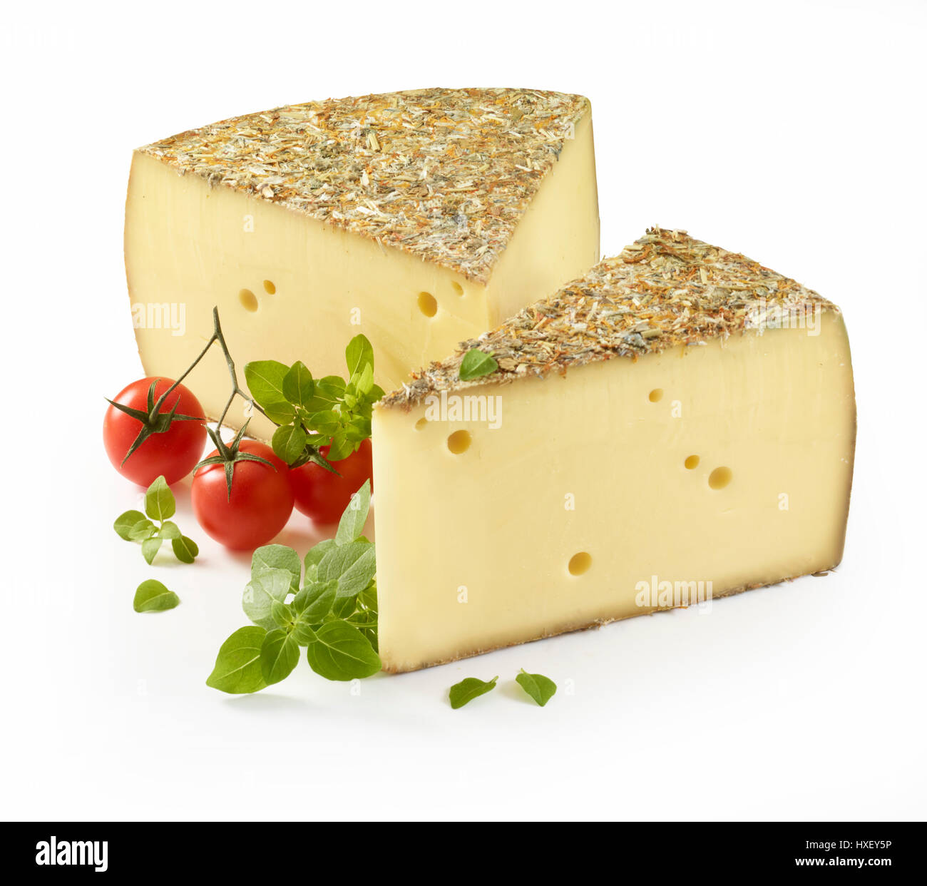 Cheese, Heukäse, basil (Ocimum basilicum) and tomato (Solanum lycopersicum) as decoration Stock Photo