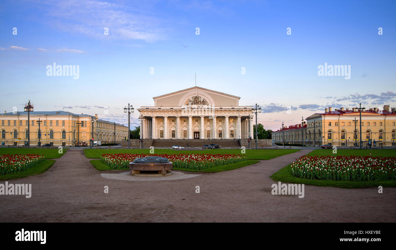 Old Stock Exchange in the morning light, summer sky, green flowerbeds, Saint-Petersburg, Russia Stock Photo