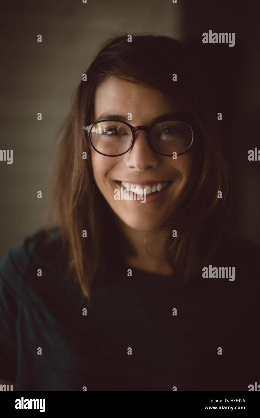 Portrait of happy woman at home Stock Photo - Alamy