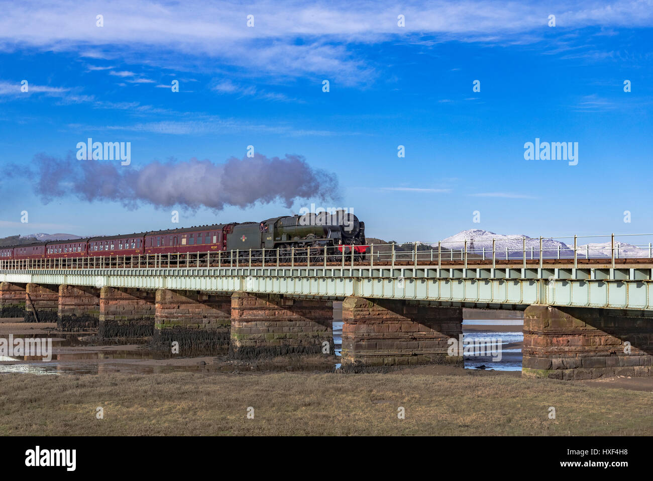 The Scots Guardsman steam train on the Eskmeals viaduct over the river Esk in Cumbria. Stock Photo