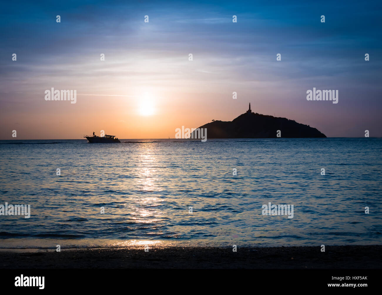Sunset view of a lighthouse in an island - Santa Marta, Colombia Stock Photo