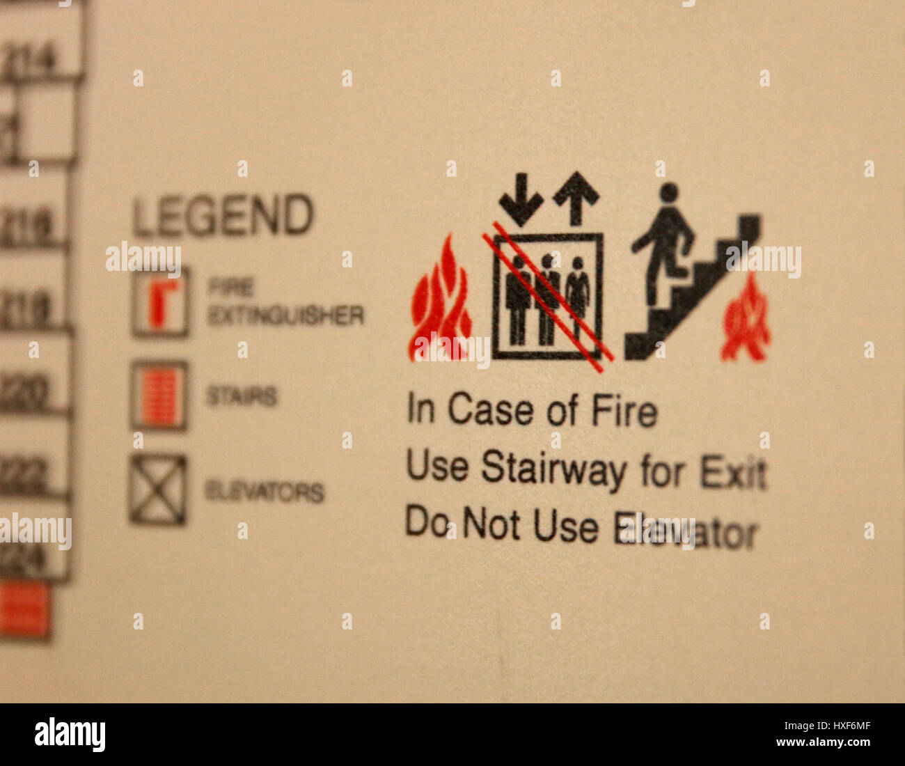 Fire Escape Route placque in a hotel room. In case of Fire Use Stairway for Exit. Do Not Use Elevator Stock Photo