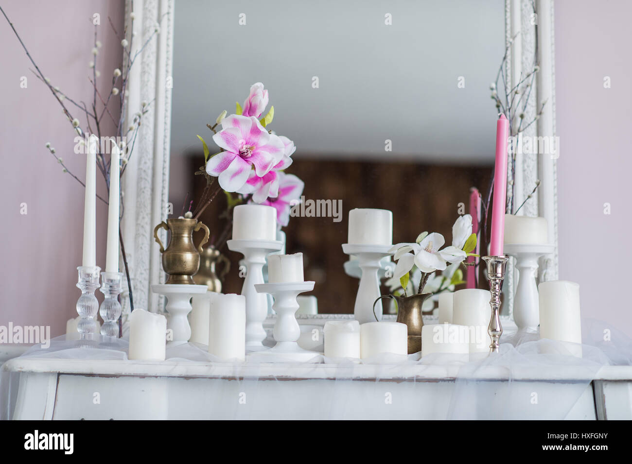 Interior design of white room with beautiful flowers on the served ...