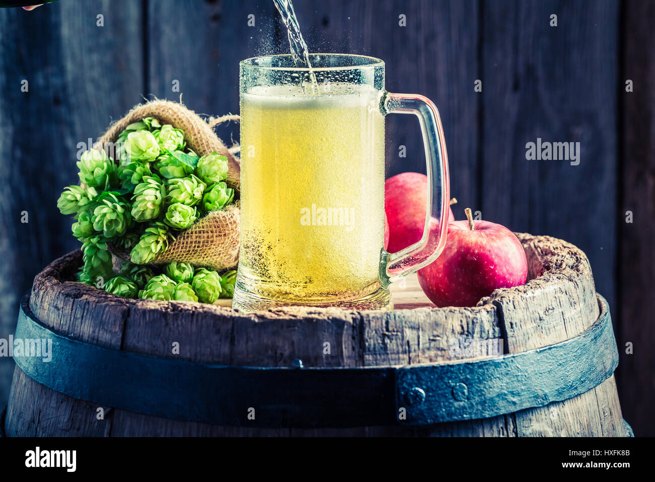 Fresh cider beer with apples, wheat and hops Stock Photo