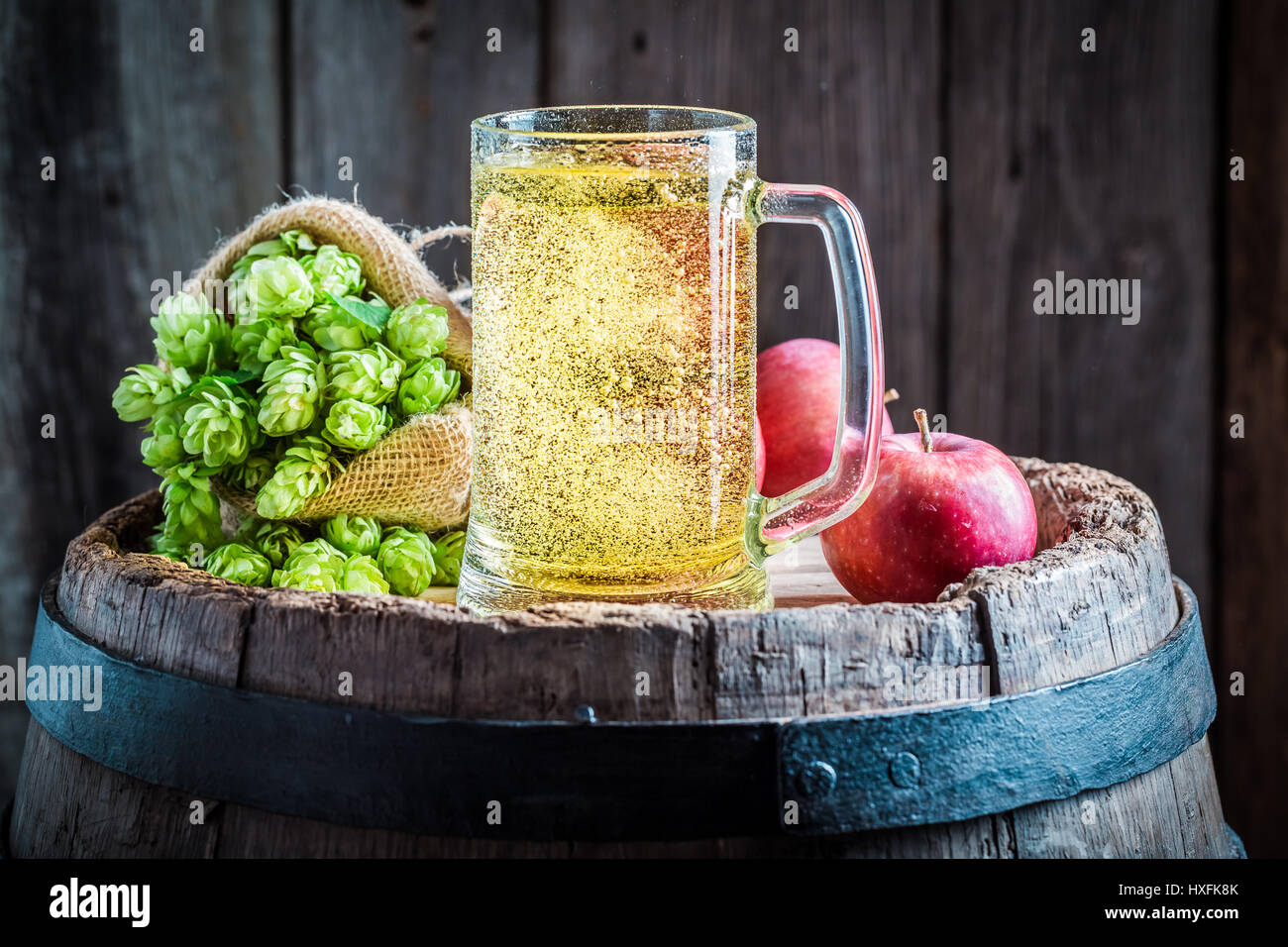 Fresh cider beer with apples, hops and wheat Stock Photo