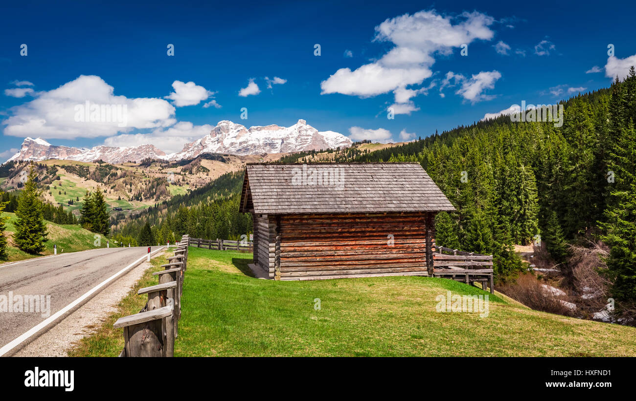 View of wooden cottage in Dolomites, Italy Stock Photo - Alamy