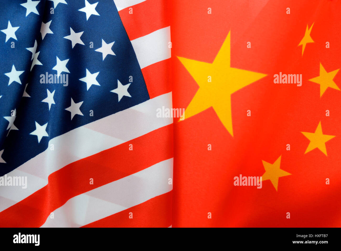 Flags of the USA and China, menacing commercial war between the economic powers, Fahnen von den USA und China, drohender Handelskrieg zwischen den Wir Stock Photo