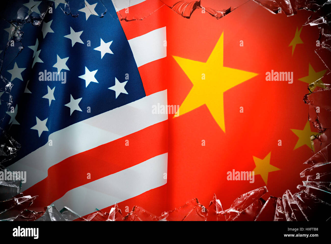 Flags of the USA and China behind broken glass, menacing commercial war between the economic powers, Fahnen von den USA und China hinter zerbrochenem  Stock Photo