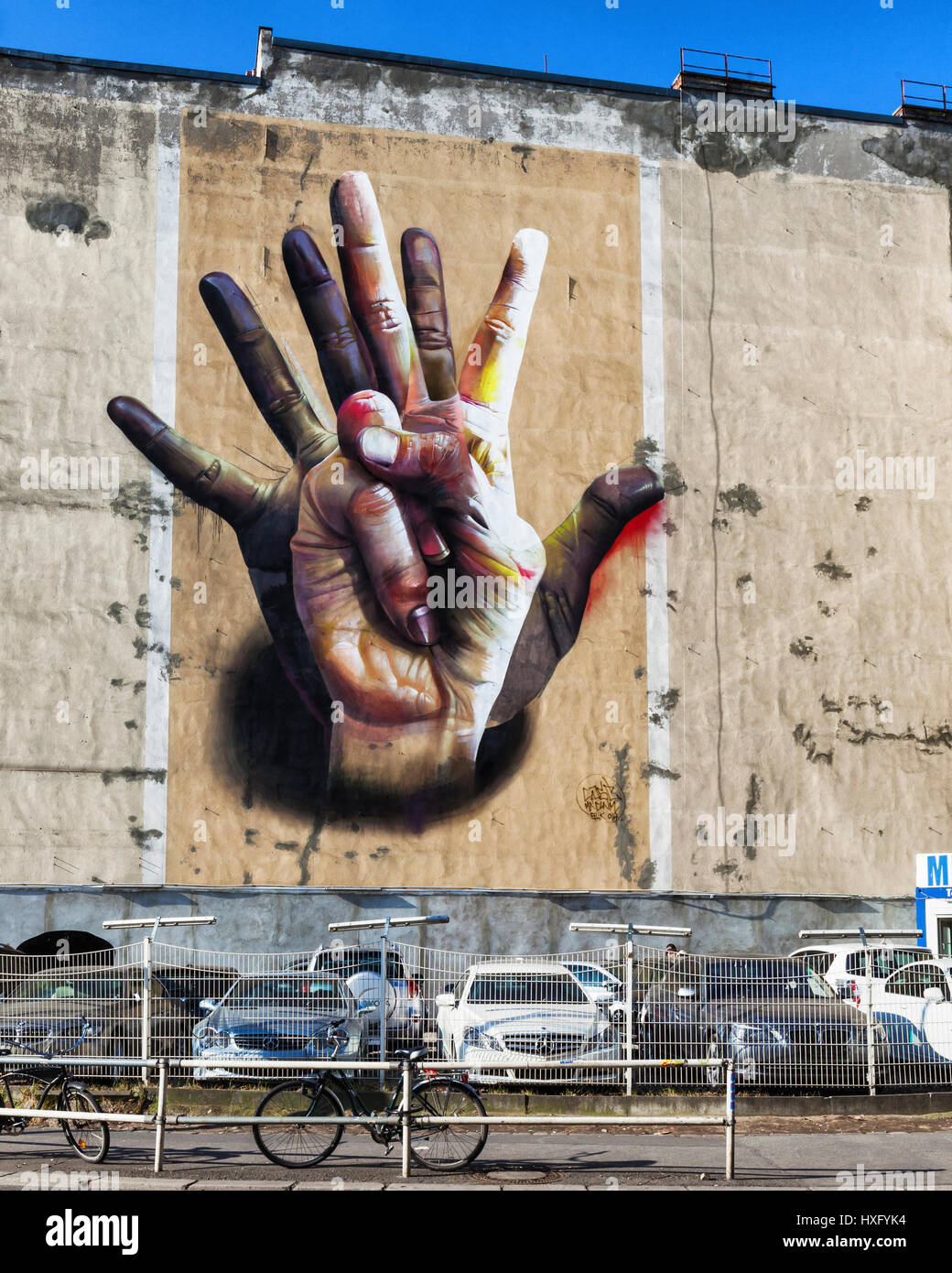 Berlin, Mitte, 'Unter der Hand " mural of overlapping hands by