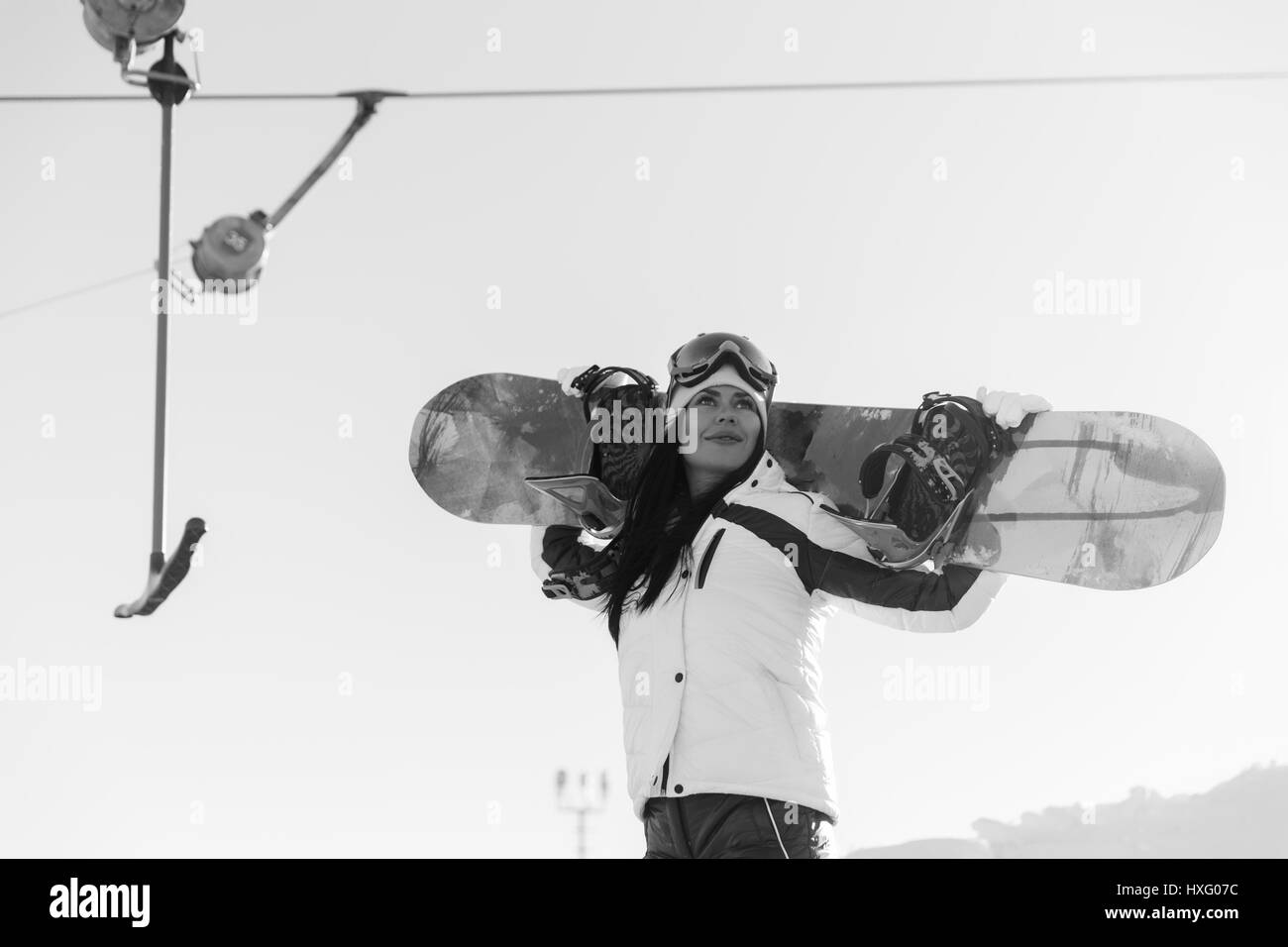 Longhaired athlete in ski suit Stock Photo Alamy