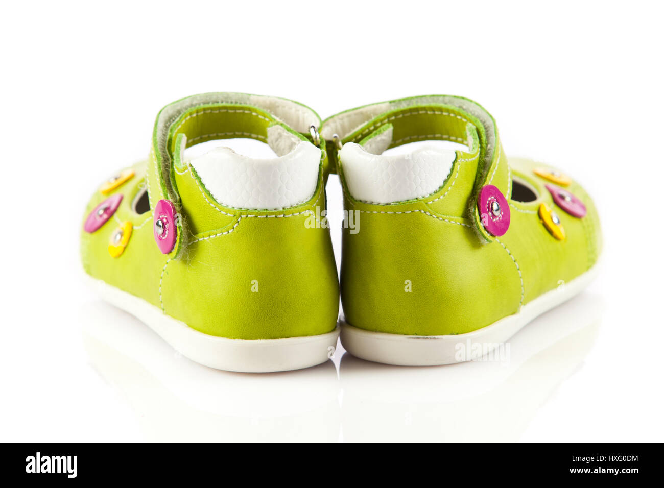 Green baby shoes. children's shoes isolated on a white background Stock ...