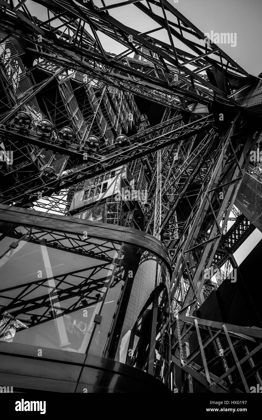 Unique perspective of the structure of the Eiffel Tower, Paris, France. In dramatic black and white. Stock Photo