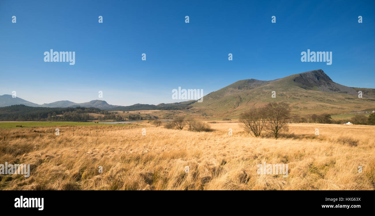 NORTH WALES, UK - MARCH 2017 - A VIEW OF THE BEDDGELERT VALLEY IN NORTH WALES WITH MOEL HEBOG IN THE DISTANCE Stock Photo