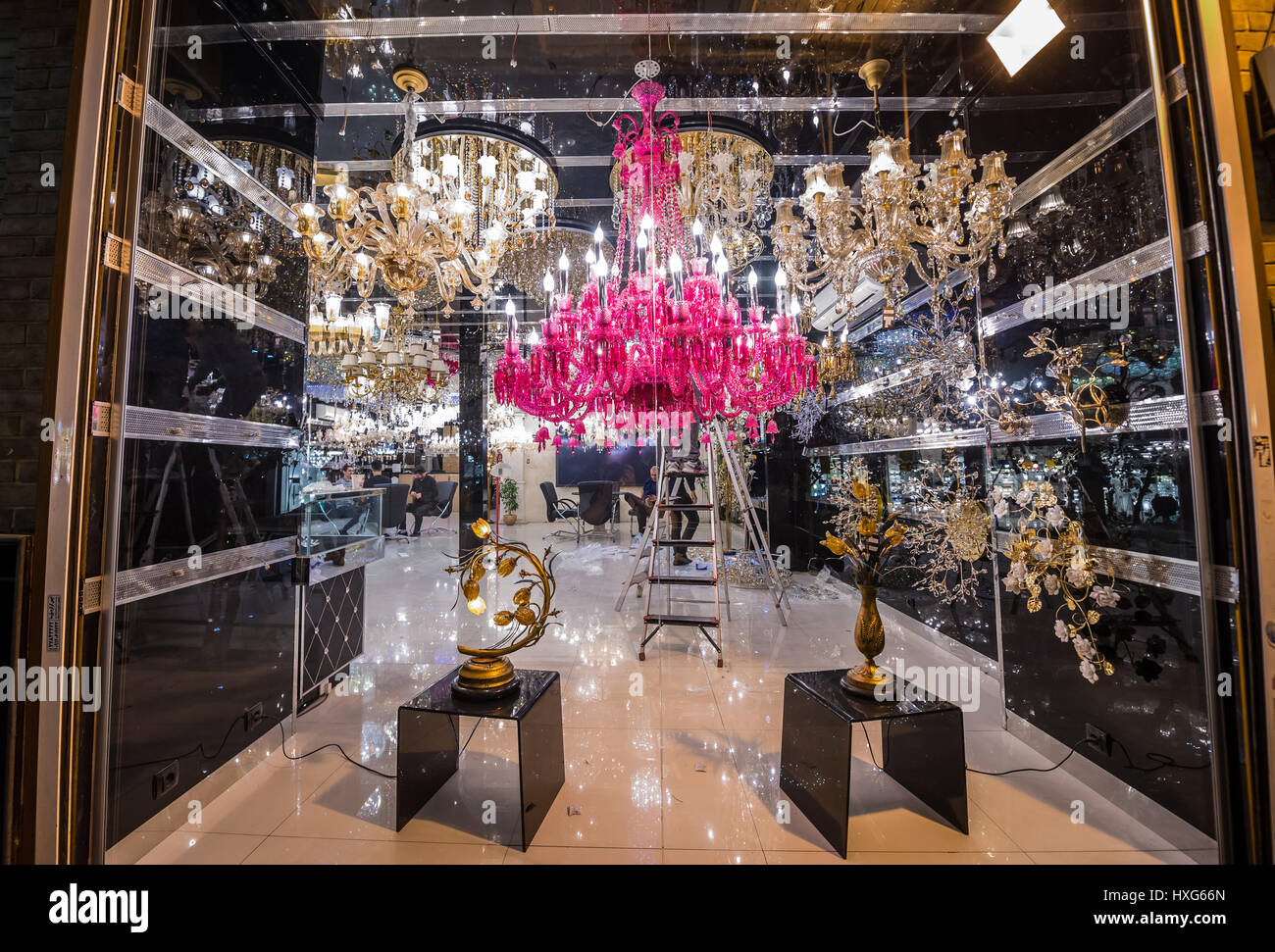 Pink chandelier in one of many lighting shop on Lalehzar Street in Tehran city, capital of Iran
