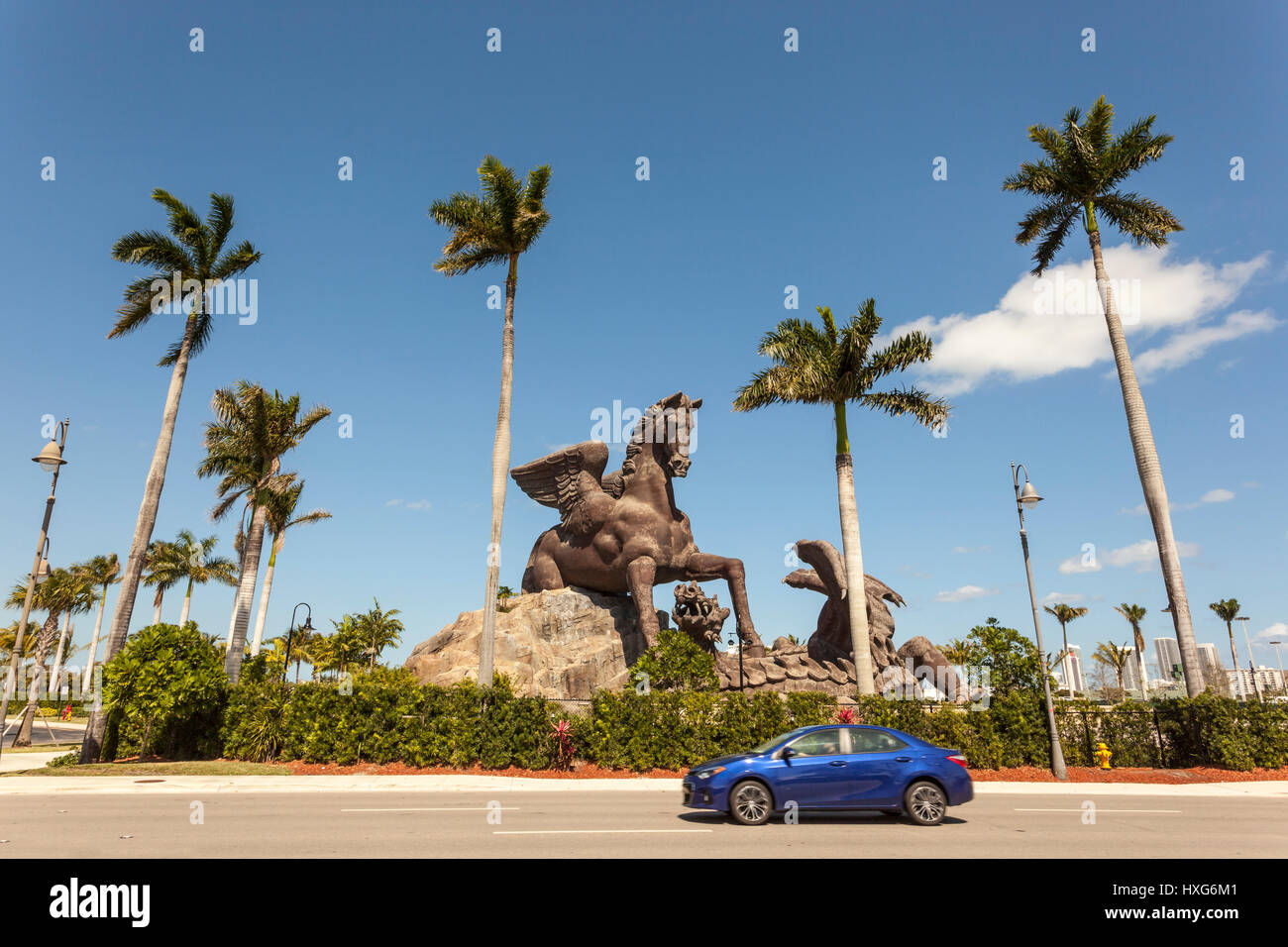 HALLANDALE BEACH, USA - MAR 11, 2017: Statue of Pegasus defeating a dragon in Gulfstream Park. Hallandale Beach, Florida, United States Stock Photo