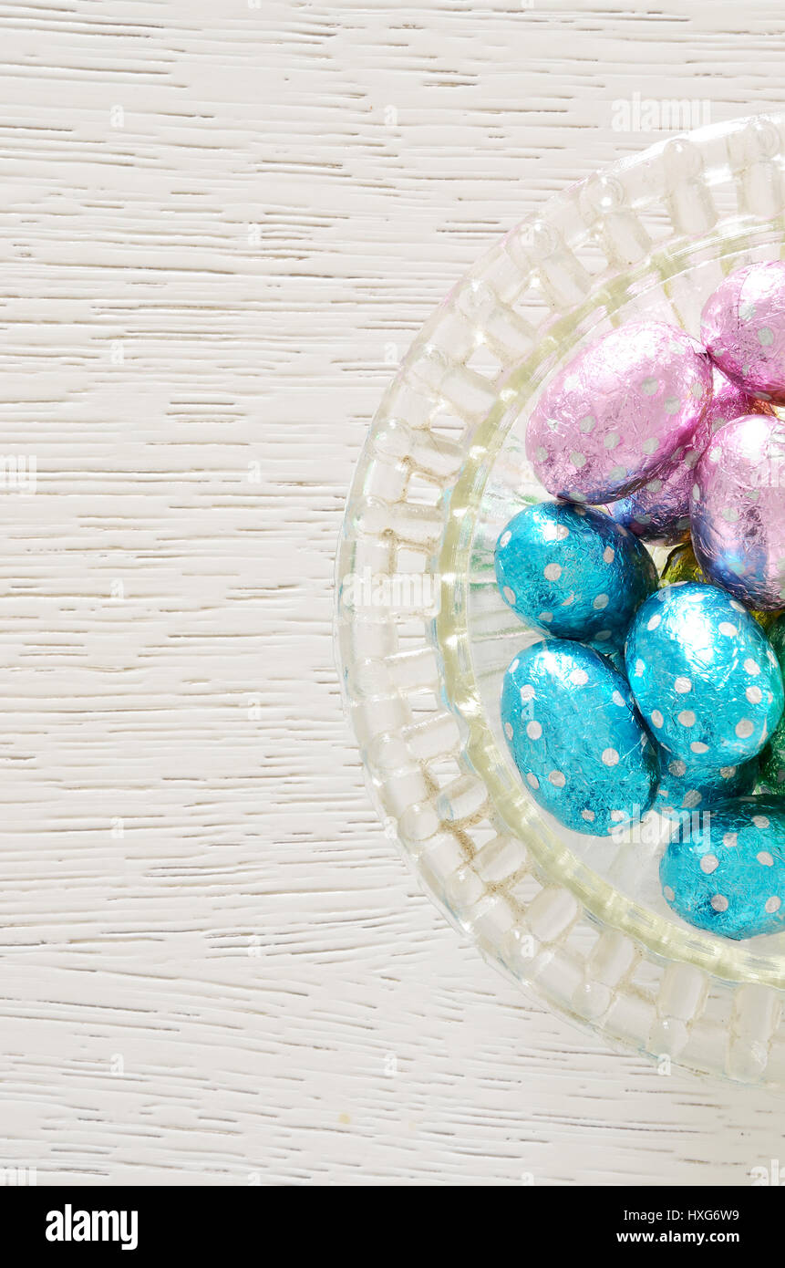 Foil Wrapped Chocolate Easter Eggs in glass bowl Stock Photo - Alamy