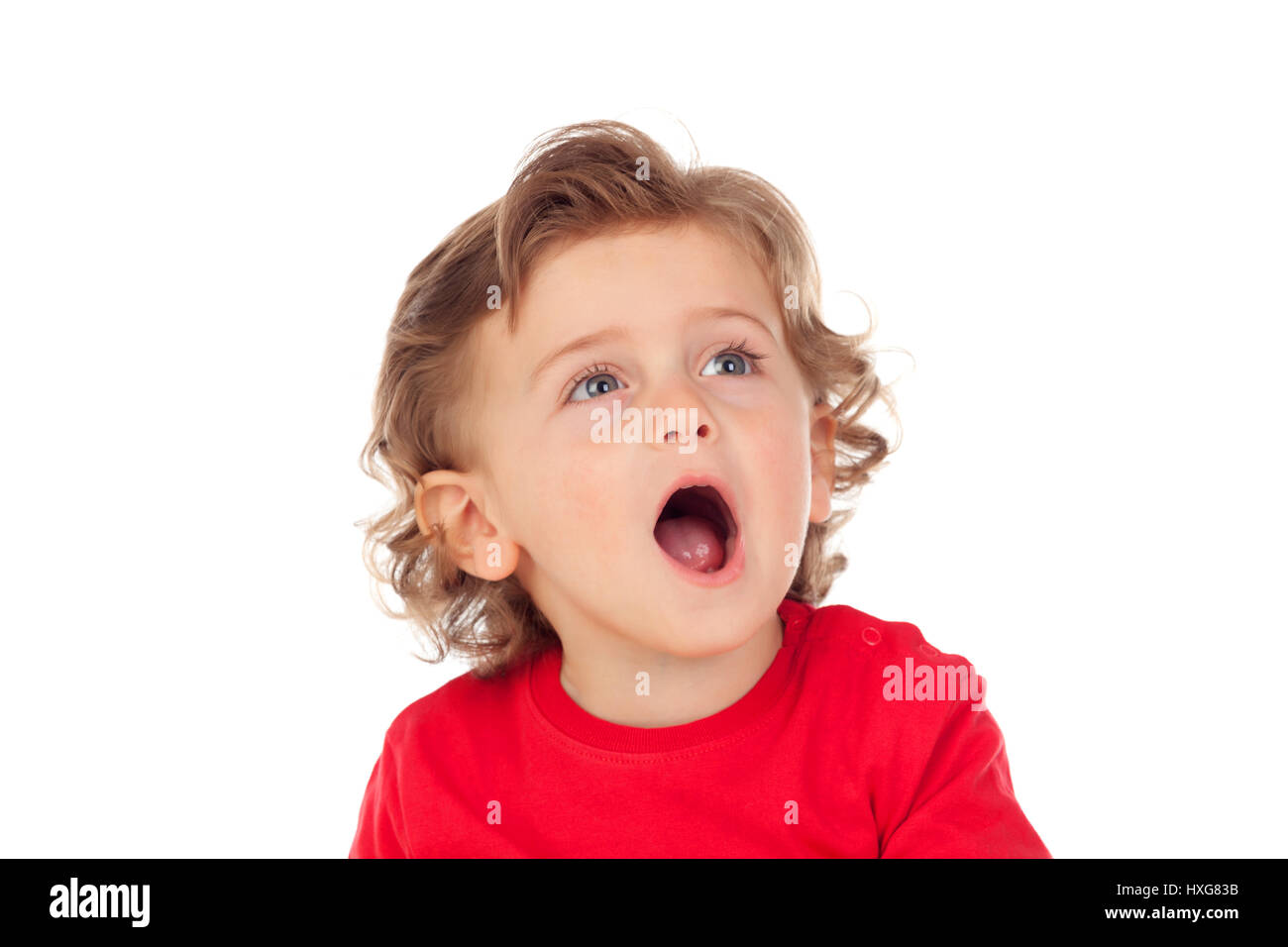 Tired baby opening his mouth isolated on a white background Stock Photo